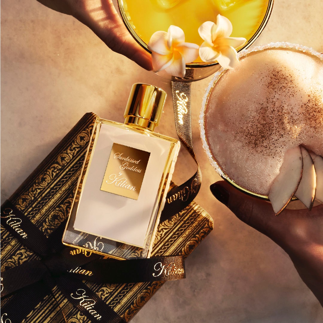 tray wtih glass and perfume